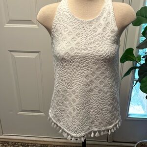Lilly Pulitzer white lined with cutouts and tassels . Zipper closure size XS